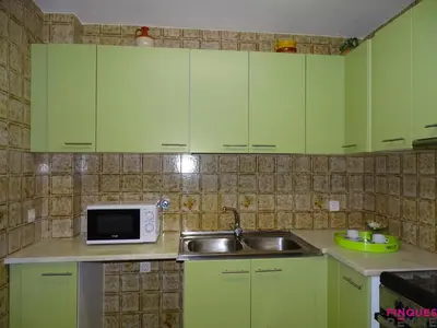 Una cocina o zona de cocina en Apartamento San Felíu 3 habitaciones cerca del paseo - ES-298-49