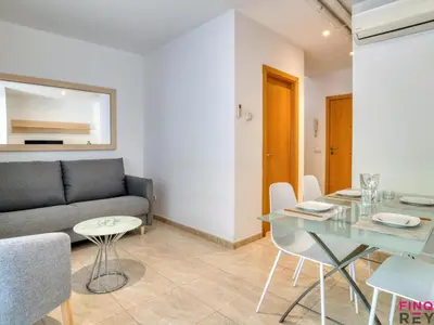 Zona de estar de Dúplex en S'agaró con 2 dormitorios y balcón, parking incluido - ES-298-32
