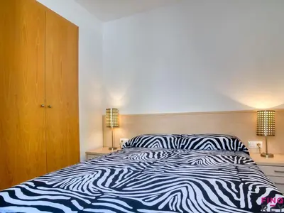 Cama o camas de una habitación en Dúplex en S'agaró con 2 dormitorios y balcón, parking incluido - ES-298-32