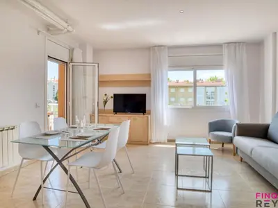 Una televisión o centro de entretenimiento en Apartamento céntrico en S'agaró, cerca de la playa, con parking - ES-298-52