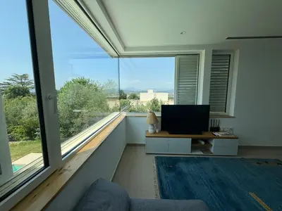 Una televisión o centro de entretenimiento en Palau Viewpoint - Attic