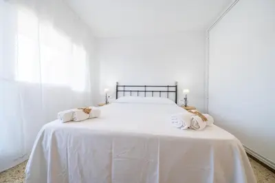 Cama o camas de una habitación en HomeHolidaysRentals Magic - Costa Barcelona