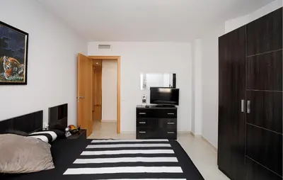 Una televisión o centro de entretenimiento en Beautiful Apartment In Pineda De Mar