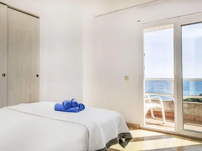 Cama o camas de una habitación en Apartment Blanes Beach by Interhome