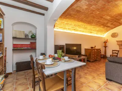 Una televisión o centro de entretenimiento en Holiday Home Can Magi by Interhome