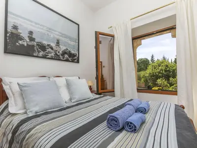 Cama o camas de una habitación en Holiday Home Can Magi by Interhome