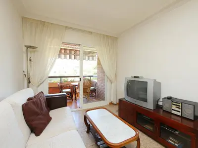 Una televisión o centro de entretenimiento en Apartment Rambla de Tossa by Interhome