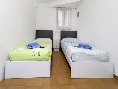 Cama o camas de una habitación en Holiday Home Platja by Interhome
