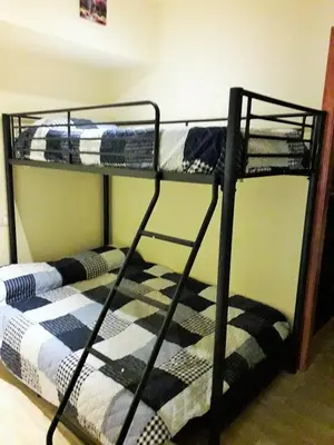 Cama o camas de una habitación en Arion Garden Apartment