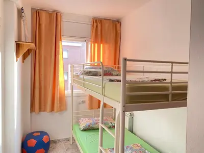 Litera o literas de una habitación en Lloret Fenals Apartment Antilles