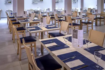 Un restaurante o sitio para comer en GHT Sa Riera