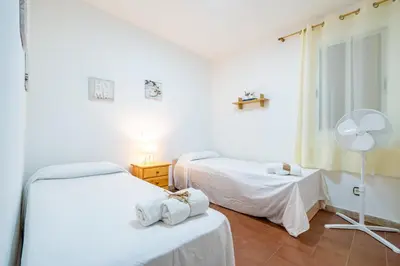 Cama o camas de una habitación en HomeHolidaysRentals Sol