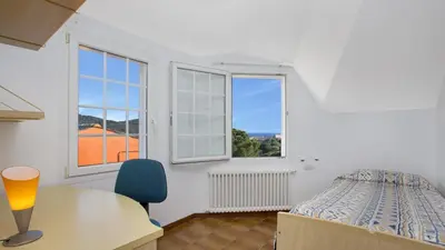 Cama o camas de una habitación en 2Monte01 - Blanes