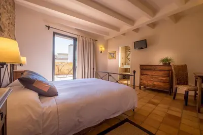 Cama o camas de una habitación en Can Caranta