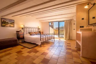 Cama o camas de una habitación en Can Caranta