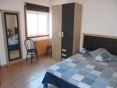 Cama o camas de una habitación en Apartamentos Elvira