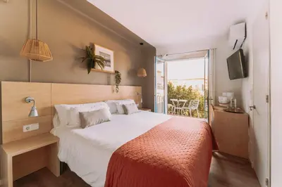 Cama o camas de una habitación en Hotel Bell Repos