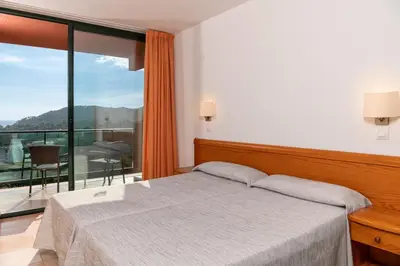 Cama o camas de una habitación en Albamar Apartaments