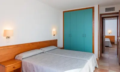 Cama o camas de una habitación en Albamar Apartaments