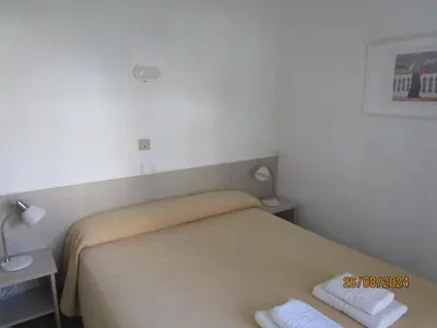 Cama o camas de una habitación en Hotel Apartaments Gesòria Porta Ferrada