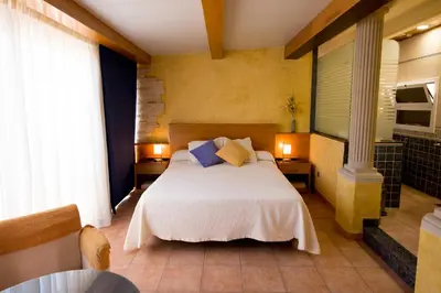 Cama o camas de una habitación en Hotel Plaça