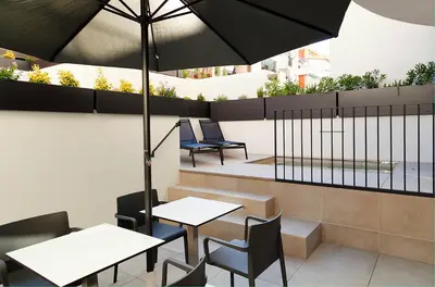 Zona de estar de Vila Arenys Hotel
