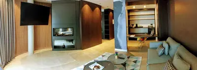 Una televisión o centro de entretenimiento en Vila Arenys Hotel