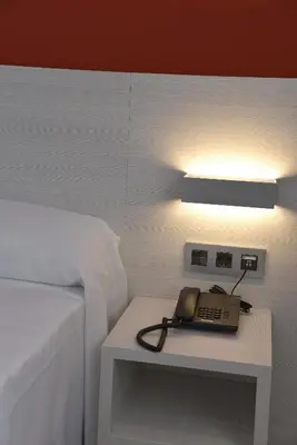 Cama o camas de una habitación en Hotel Julimar