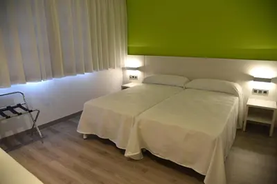 Cama o camas de una habitación en Hotel Julimar