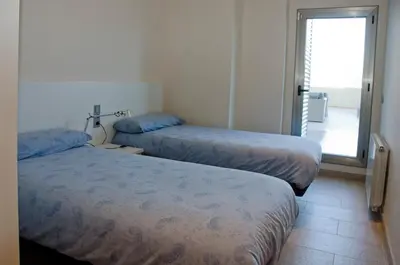 Cama o camas de una habitación en AB Sant Antoni de Calonge