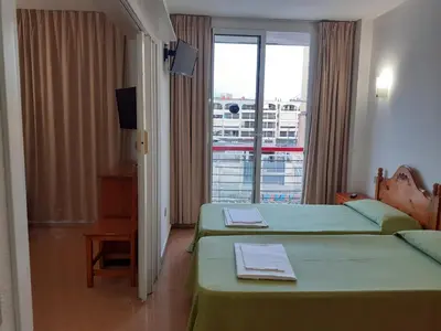 Cama o camas de una habitación en Apartaments Mar Blau Calella