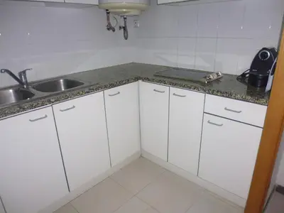Una cocina o zona de cocina en Apartamento Blanes Vela Port