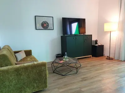 Una televisión o centro de entretenimiento en Lloret Vibe Affiliated by FERGUS