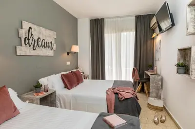 Cama o camas de una habitación en Hotel Bulevard