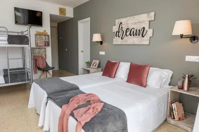 Cama o camas de una habitación en Hotel Bulevard