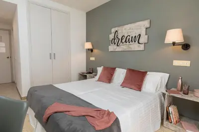 Cama o camas de una habitación en Hotel Bulevard