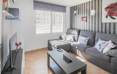 Una televisión o centro de entretenimiento en Awesome Apartment In Malgrat De Mar