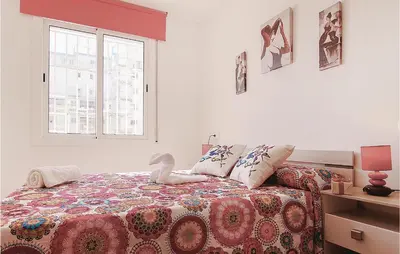 Cama o camas de una habitación en Awesome Apartment In Malgrat De Mar