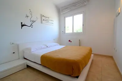 Cama o camas de una habitación en Trias Plaza
