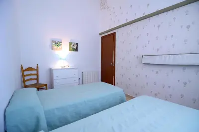 Cama o camas de una habitación en Trias Plaza