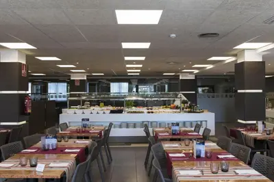 Un restaurante o sitio para comer en Hotel Papi