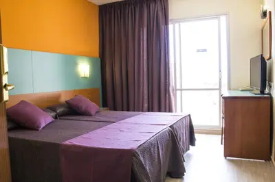 Cama o camas de una habitación en Hotel Papi