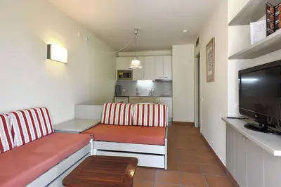 Una cocina o zona de cocina en Aparthotel Ciutat de Palol