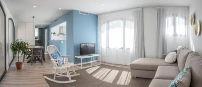 Una televisión o centro de entretenimiento en Cliper Apartments by Escampa Hotels