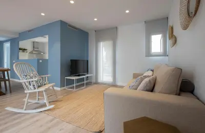 Una televisión o centro de entretenimiento en Cliper Apartments by Escampa Hotels