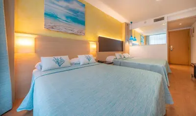 Cama o camas de una habitación en Hotel Blaumar