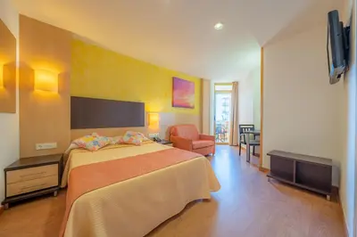 Cama o camas de una habitación en Hotel Blaumar