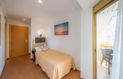 Cama o camas de una habitación en Hotel Blaumar