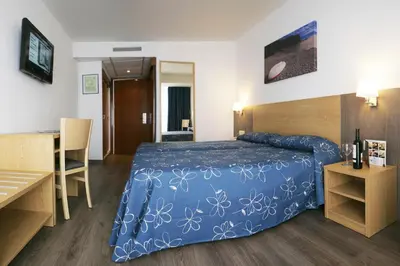 Cama o camas de una habitación en Hotel Acapulco