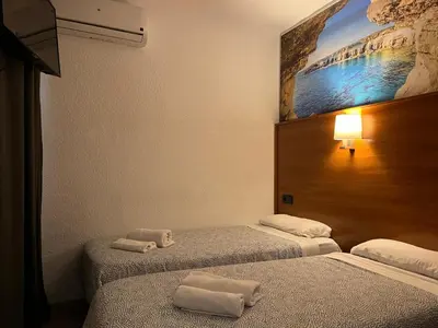 Cama o camas de una habitación en Hotel Maremagnum